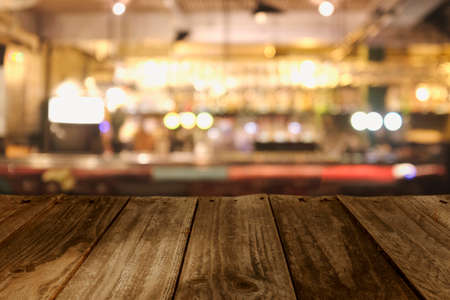 Top wood table Blur minimal cafe shop midcentury style background. cafe in store Blur Background or design key visual layoutの写真素材