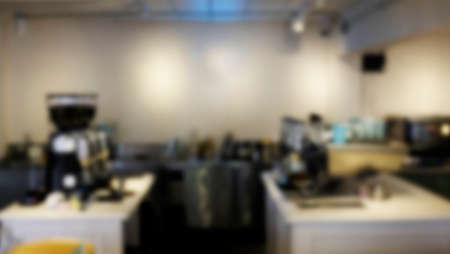 Blur coffee shop interior background - can used for display or montage your products.barista in counter barの写真素材