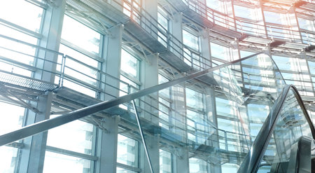 Structural texture architect facade background. Modern and conteporary arcitect. Structural glass facade curving roof of fantastic office building.Abstract architecture fragment.の写真素材