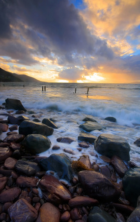 dramatic sky at rossbeigh on west coast of kerryの写真素材