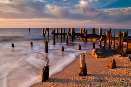 Long Exposure of Pier, Sunset Beach, Cape May, New Jerseyの写真素材