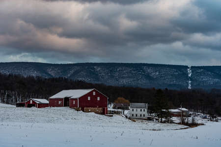 Snowy Perry County Farm At Sunset, Pennsylvania, USAのeditorial素材