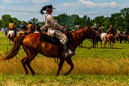Confederate Officer Trotting To Battle, Gettysburg 150th Reenactment, July 2013のeditorial素材