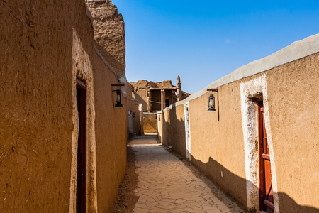 Partially restored traditional mudbrick houses near the Munikh Castle Archeological Site, Al Majmaah, Saudi Arabiaの写真素材