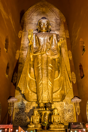 Standing Buddha  Gautama  West facing,  the Ananda Temple, Old Bagan, Myanmarのeditorial素材