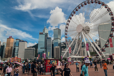 The observation wheel on the Victoria Harbor front, Hon Kongのeditorial素材