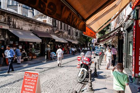 A small cobblestone street with shops near Nuruosmaniye Mosque, Istanbul