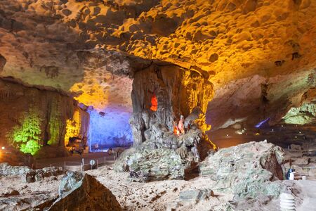 Stalactite and stalagmite formations in a limestone cave of Halong Bay, Vietnamの写真素材