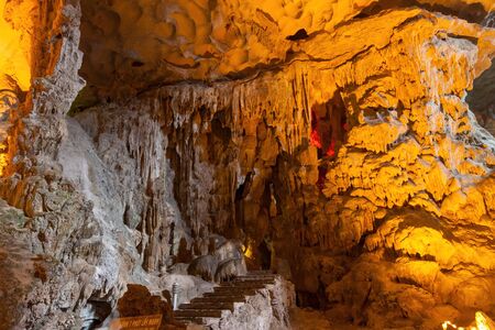 Stalactite and stalagmite formations in a limestone cave of Halong Bay, Vietnamの写真素材