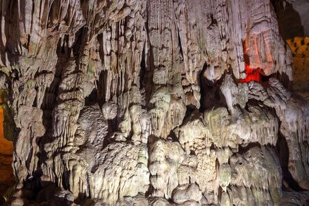 Stalactite and stalagmite formations in a limestone cave of Halong Bay, Vietnamの写真素材