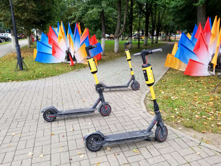 Kaluga, Russia - August 27, 2021: Electric scooters for rent in the city park
