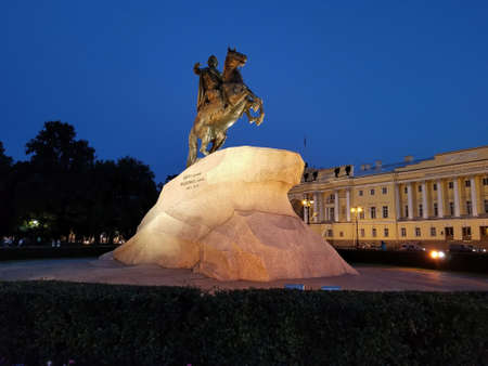 The famous "Bronze Horseman", a monument to Peter The Great in Saint Petersburg, illuminated at nightのeditorial素材