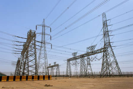 A high-voltage power line masts in Riyadh Province, Saudi Arabiaの写真素材