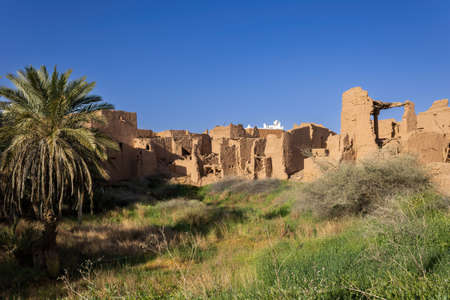 Ruins of traditional Arab mud brick architecture in Ushaiqer, Saudi Arabiaの写真素材