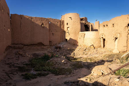 Ruins of traditional Arab mud brick architecture in Ushaiqer, Saudi Arabiaの写真素材