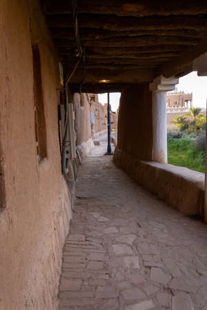 A covered narrow street in Ushaiqer Heritage Village, Saudi Arabiaの写真素材