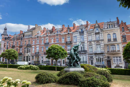 Palmerston Avenue with architecture in the Flemish Renaissance style and Les Bassins du Square Palmerston, Brussels, Belgiumのeditorial素材