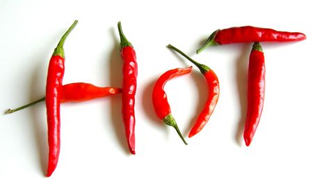 Red hot peppers on a white backgroundsの写真素材