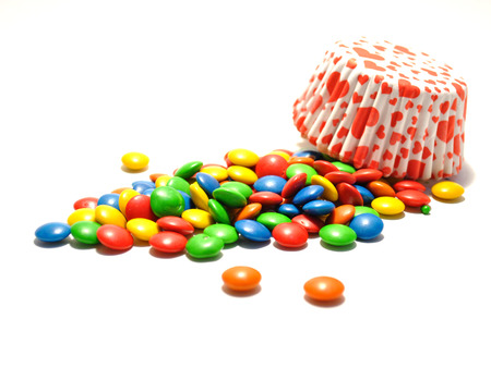 Coloured candies from a basketのeditorial素材