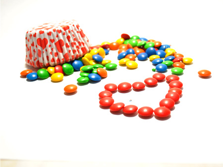 Coloured candies from a basket
