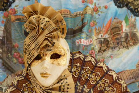 Venetian range and mask with staffの写真素材
