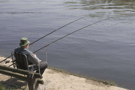 Man fishing at river. の写真素材