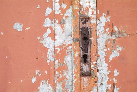 Grunge Background corroded door locker chiped off red paintの写真素材