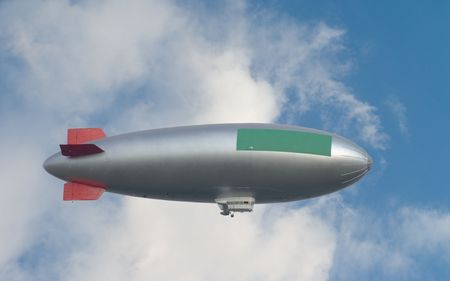 zeppelin against clouds, free copy space, big blimp, free ad spaceの写真素材