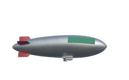 zeppelin against clouds, free copy space, big blimp, free ad space, isolated on white backgroundの写真素材