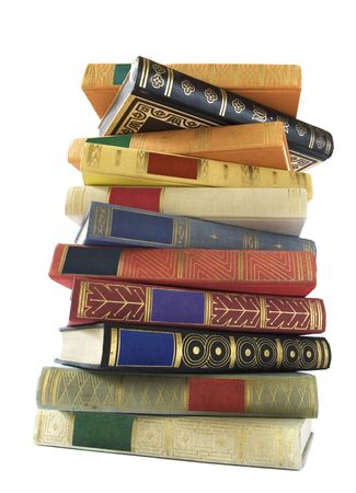 stack of vintage books isolated on white background, blank labels, free copy spaceの写真素材