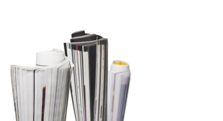 rolled up magazines, isolated on white background, free copy space の写真素材