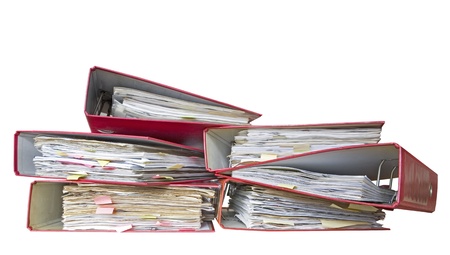 messy file folders / office folders , isolated on white backgroundの写真素材