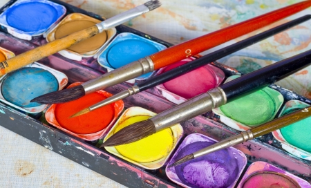 artist toolbox, piant box and paint brushesの写真素材