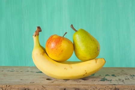 fruit, bananas, apple, pear, green background, free copy spaceの写真素材