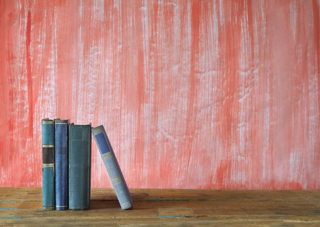 row of books, grungy background, free copy space の写真素材