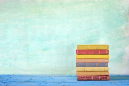 stack of books, grungy background, free copy space の写真素材