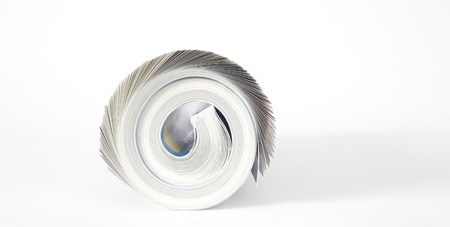 rolled up magazine,newspaper,free copy spaceの写真素材