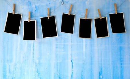 photo frames on blue wall
