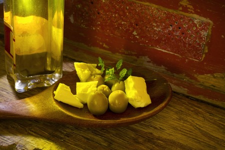 Olives,feta cheese and olive oil, closeup shot, free copy spaceの写真素材