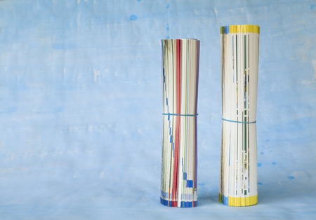 rolled up newspapers or magazines, free copy spaceの写真素材