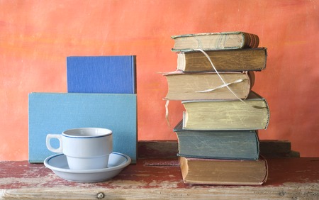 vintage books with a cup of coffee, free copy spaceの写真素材