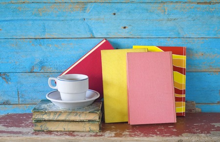 vintage books and a cup of coffee, free copy spaceの写真素材