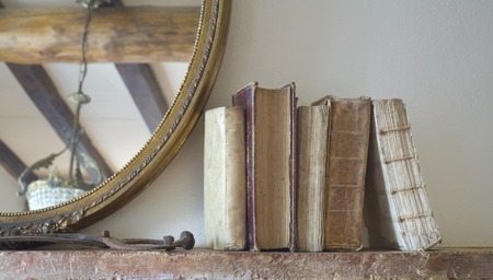 Vintage Books in rustic living room free copy spaceの写真素材