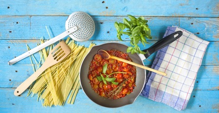 italian spaghetti sauce, food ingredients, kitchen utensilsの写真素材