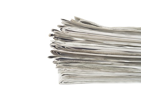 stack of newspapers, close up, isolated on white back,free copy spaceの写真素材