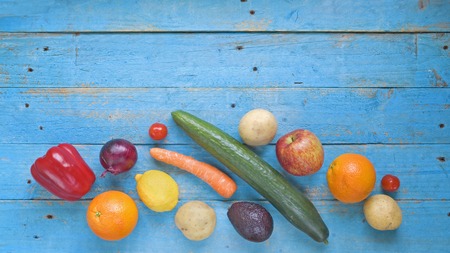 Healthy food. Vegetables and fruit on a rustic table, top view,good copy spaceの写真素材