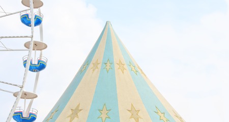 ferris wheel and tent on a fair, good copy spaceの写真素材
