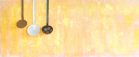 old enamel kitchen utensils,good copy space,panoramic formatの写真素材