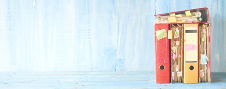 messy file folders and documents,panoramic format, good copy space の写真素材