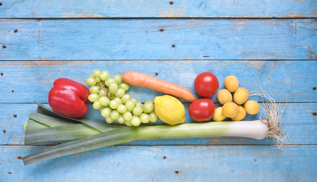 Healthy food. Vegetables and fruit on a rustic table, good copy spaceの写真素材